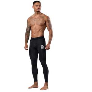 Leggings de compression pour hommes noirs, pantalon extensible, couche de base athlétique pour la salle de sport, l'entraînement, la course à pied, la forme physique et les performances sportives - Product Image 1