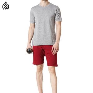 Short en molleton de coton pour homme Motif solide Poches à fermeture éclair Short de survêtement en molleton décontracté pour la maison Jogger Fitness Longueur au genou - Product Image 5
