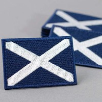 L'écusson du drapeau écossais, le drapeau du pays de l'Écosse, l'emblème national de la croix de St Andrew, le fer brodé sur