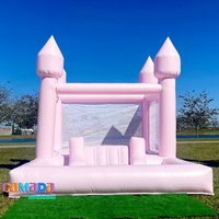 Château gonflable commercial rose pastel en PVC, avec piscine à balles, idéal pour les fêtes et les mariages