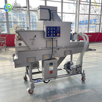 Machine automatique de panification et d'enrobage de filets de poisson