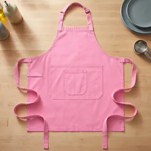 Tablier rose en toile robuste avec poche avant, réutilisable et lavable en machine, pour les produits de nettoyage et l'usage quotidien - Product Image 1