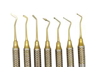 Ionómetro de vidrio compuesto Dental, instrumentos de llenado de amalgama, 7 piezas recubiertas de Plasma dorado - Product Image 2