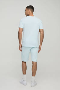 Ensemble t-shirt et short pour homme à empiècements coupe ajustée et logo personnalisé très exigeant Ensemble 2 pièces Tenue de sport et d'entraînement Vêtements de plage et de rue - Product Image 2