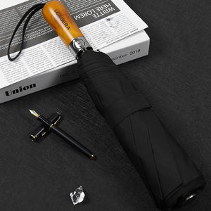 Parapluie pliant de luxe personnalisé noir grande taille 27 pouces coupe-vent avec poignée en bois pour voyage, soleil et pluie, avec impression de logo - Product Image 1
