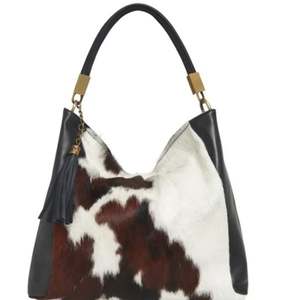 Pochette décontractée en cuir de vache-idéal pour un style de vie en déplacement - Product Image 4