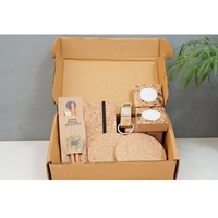 Ensemble de cadeaux d'entreprise de produits en liège contenant des stylos de créateur sous-verres T-light et des agendas promotionnels et des carnets de notes Cadeaux d'affaires