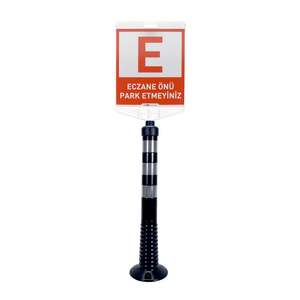 Juego de delimitadores con señal de advertencia negra tipo bolardo con la inscripción 'No Estacionar' en frente a la farmacia - Product Image 1