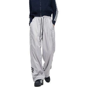 Hombres personalizado de alta calidad Casual Mid Streewear pierna ancha de gran tamaño tira lateral invierno Nylon Joggers pantalones de chándal OEM - Product Image 1