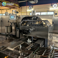 Machine industrielle automatique de formage, de cuisson et de transport de gaufrettes, de rouleaux d'œufs et de biscuits pour ligne de production de snacks à grande échelle