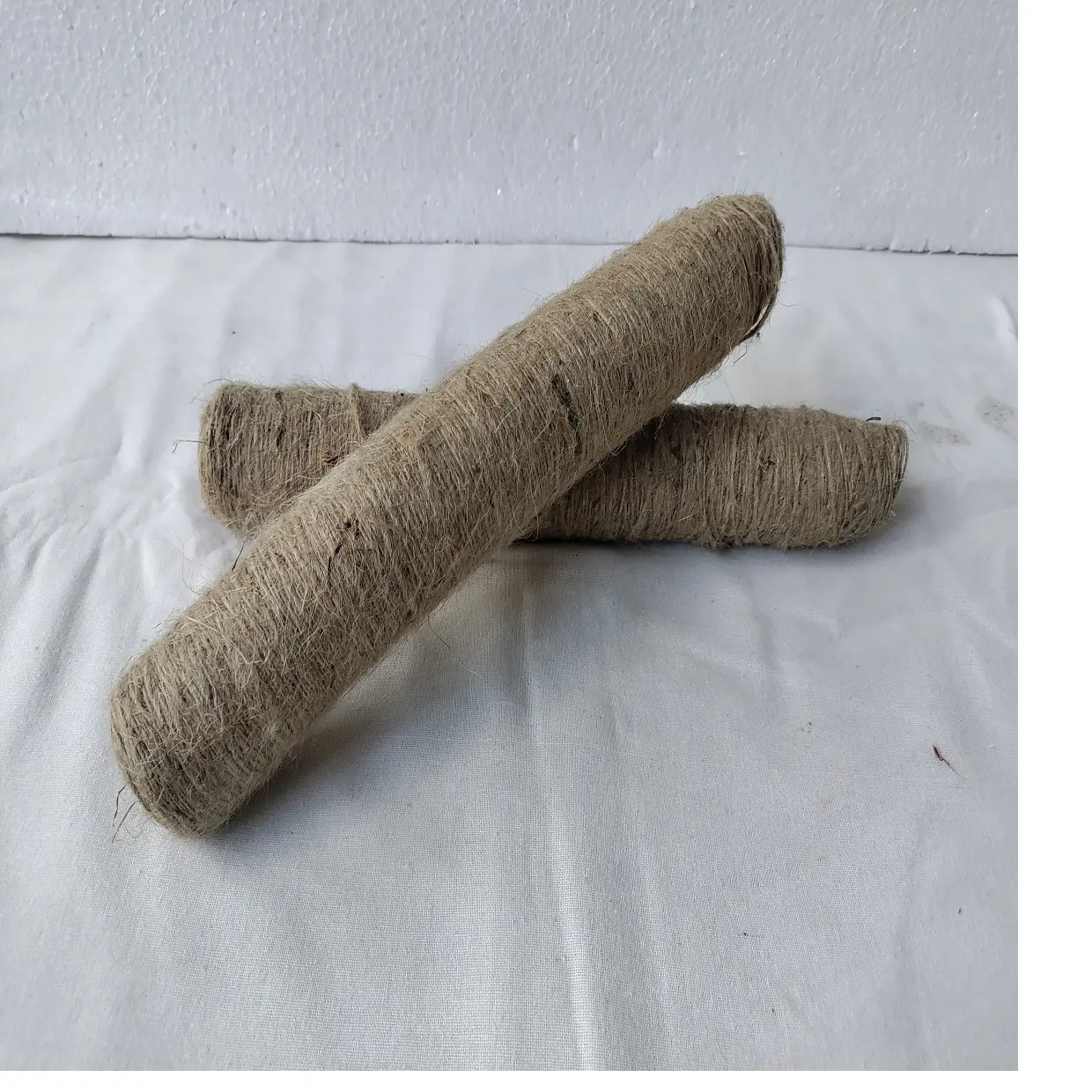 Custom made natural jute fiber yarns in 1 ply suitable for resale by yarn and fiber stores ideal for textile weavers for resale