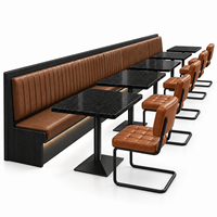 Ensemble de chaises et banquettes de restaurant industriel en cuir marron avec table en granit noir pour café, hôtel, bistrot