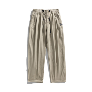 กางเกงขายส่งผ้าแคนวาสคุณภาพพรีเมียม น้ำหนักเบา ทรงตรง สไตล์ลำลองสำหรับผู้ชาย ระบายอากาศดี แฟชั่นแนวสตรีท พร้อมบริการสกรีนโลโก้และออกแบบ OEM - Product Image 1