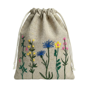 Bolsa de Algodón Reutilizable con Cordón, Ecológica, Duradera, con Bordado Floral Amarillo, Diseño Elegante para Guardar Artículos Pequeños - Product Image 1