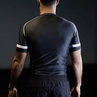 Rashguards personnalisés à manches longues entièrement sublimés pour le surf, le BJJ et le MMA, respirants, à séchage rapide, antibactériens, en Spandex/Polyester
