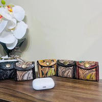 Meilleure vente 2025 luxe fabriqué à la main en cuir véritable usiné Air Pod housses de protection en cuir fleuri housse de voyage pochette