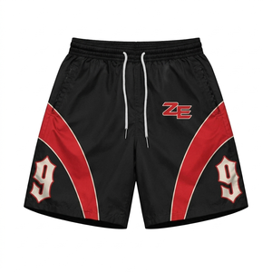 Shorts coupe-vent en micro-polyester premium 160 GSM, décontractés, avec empiècements contrastants noir et rouge sur le devant, logo personnalisé - Product Image 1