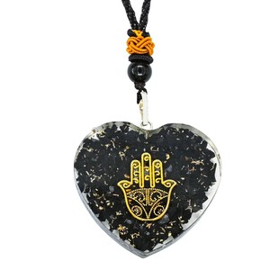 Colgante de orgón de shungita natural hecho a mano de La India en forma de corazón con logotipo de Hamsha para protección EMF tipo ágata - Product Image 1