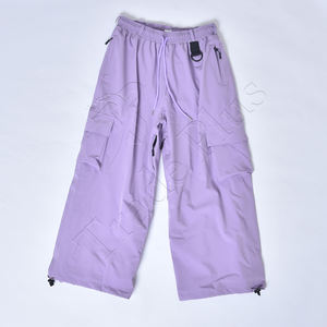 Pantalones de esquí a prueba de viento de tela de poliéster personalizados de fábrica nueva decoración de bolsillo con patrón bordado pantalones de moda para Unisex - Product Image 1