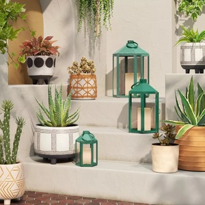 Linternas de vela de metal/vidrio de diseño clásico, linterna de suelo decorativa de Color verde para decoración de hogar y jardín - Product Image 1