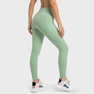 La mejor calidad Butt Lift Mujeres Yoga Pantalones Leggings con agujeros Seamless Crossover Cintura Yoga Leggings - Product Image 1