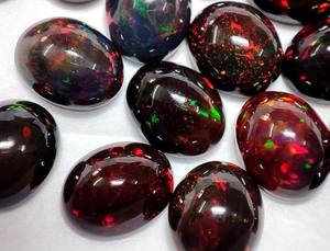 Opale d'Éthiopie Pierre précieuse ovale noire Taille personnalisée 8x6mm 9x7mm Dos plat Cabochon poli Ovale noir Opale de Welo Fire d'Éthiopie - Product Image 2