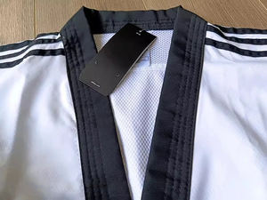 Uniforme de Taekwondo de la Mejor Calidad, Servicio OEM Profesional, Ropa Deportiva Hecha en Pakistán con Logotipo en la Parte Delantera - Product Image 3
