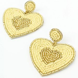 Boucles d'oreilles brodées uniques avec motif floral - Product Image 1