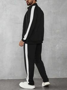 เสื้อแจ็คเก็ตแทร็คสีดำแบบซิปเต็มตัวสำหรับผู้ชาย พร้อมแถบข้างสีขาว และกางเกงแทร็คสูทเข้าชุด รับผลิตแบบ OEM ODM ขายส่งเสื้อผ้า - Product Image 6