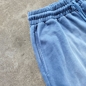 Nuevo 2025 de gran tamaño personalizado Streetwear pantalones holgados hombres angustia ácido lavado agujero dobladillo apilado pantalones de chándal acampanados - Product Image 3