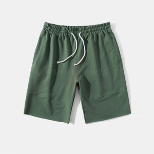 Shorts d'été pour hommes style urbain, en coton de haute qualité, décontractés, respirants, taille élastique mi-haute, motif uni sur le devant - Product Image 1