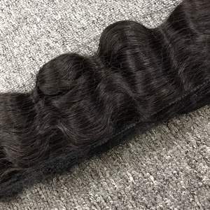Vente en gros de haute qualité 100% extensions de cheveux crus vierges vietnamiens couleur claire de vague naturelle pour cheveux longs grand stock - Product Image 4