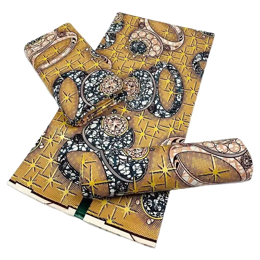 Venta al por mayor de tela suave de cera dorada de alta calidad inventario limitado diseños coloridos tela estampada de cera africana
