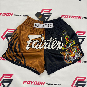 กางเกงมวยไทยแฟร์เท็กซ์สีน้ำตาลดำ ดีไซน์ล่าสุดระดับมืออาชีพ พร้อมโลโก้ส่วนตัว อุปกรณ์ต่อสู้ศิลปะการต่อสู้ ผ้าซาตินโพลีเอสเตอร์ สำหรับ MMA - Product Image 1