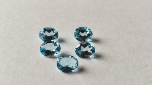 Chất lượng cao 3x5mm -15x20mm hình bầu dục mặt bầu trời màu xanh Topaz giá bán buôn đá quý tự nhiên lỏng cắt Un đá nóng nhà máy - Product Image 2