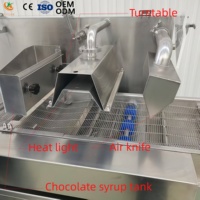 Machine d'enrobage automatique de chocolat haute performance multi-usages pour les céréales croustillantes naturelles avec tunnel de refroidissement
