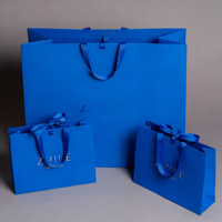 Sac en papier d'emballage cadeau de luxe en carton de qualité supérieure avec logo de marque imprimé personnalisé
