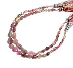 ลูกปัดทัวร์มาลีนเรียบธรรมชาติหลายลูกประมาณรูปไข่ 9 นิ้ว - Product Image 1