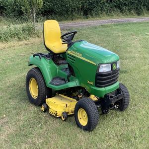 Tractor cortacésped John Deere con descarga trasera y recolección trasera, con cuchillas de trituración - Product Image 1