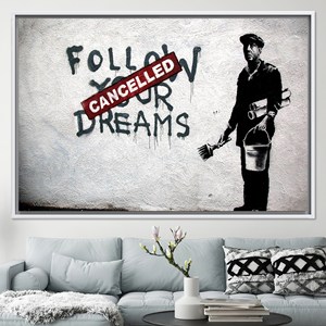 Banksy Graffiti <b>Canvas</b> Art: 'Cancelled Dreams' Printed Wall Decor,WHITE <b>FRAMED</b> <b>CANVAS</b> - Product Image 1