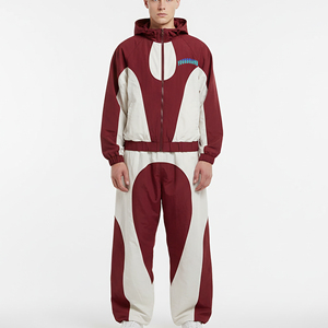Hot Selling 100% Nylon Lightweight <b>Stitched</b> Panelled Windbreaker Sweatsuit 2 Piece Oversize Zipper Jacket & Jogger Set - Product Image 1