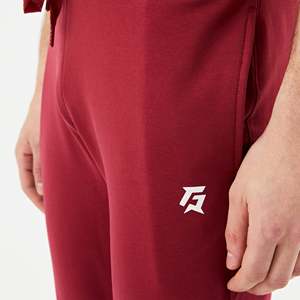 กางเกงวอร์มทรงบานสีแดงเบอร์กันดี GA Slim Fit สวมใส่สบาย เหมาะสำหรับออกกำลังกาย พร้อมโลโก้ปรับแต่งได้ ตกแต่งด้วยซิป มีไซส์ XL ถึง 6XL - Product Image 5