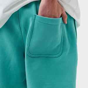 กางเกงขาสั้นแห้งเร็วของผู้ชายแบบปรับแต่งได้2025เอวขนาดกลางมีกระเป๋าข้างกางเกงขาสั้นสำหรับฤดูหนาวย้อมธรรมดาบริการ OEM - Product Image 3