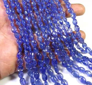 พลอยแทนซาไนต์สีน้ำเงินสวยงาม รูปทรงวงรี ธรรมชาติ คุณภาพสูง ขัดเงาเรียบเนียน โปร่งใส ผ่านการอบความร้อน ลูกปัดเปลี่ยนสี ความยาว 18 นิ้ว - Product Image 5