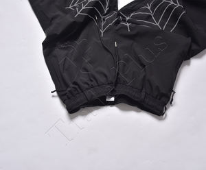 Pantalon de neige imperméable noir personnalisé OEM avec impression de toile d'araignée réfléchissante, taille ajustable, doublure chaude et poignets élastiques - Product Image 4