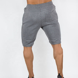 Pantalones cortos deportivos de poliéster 100% transpirables para hombre al por mayor, pantalones cortos de gimnasio ligeros y que absorben el sudor para correr y hacer ejercicio - Product Image 3