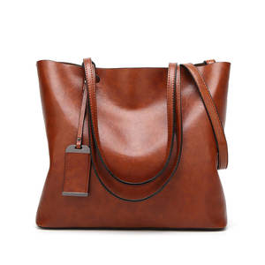 กระเป๋าถือหนังแท้สำหรับผู้หญิง Hamid International คุณภาพพรีเมียม ขายดี วัสดุทนทาน ใช้งานสะดวก ปรับแต่งได้ - Product Image 1