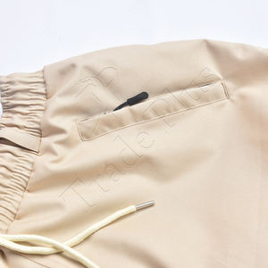 Vente en gros grande taille vêtements décontractés pour hommes logo personnalisé pantalon cargo baggy vêtements de rue style parachute coupe-vent extérieur imprimé - Product Image 4