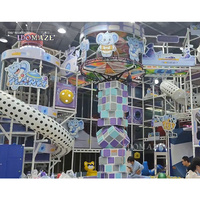Solutions clés en main directes d'usine magiques tous les âges appropriés toboggan jeux d'arcade interactifs complexes aire de jeux intérieure