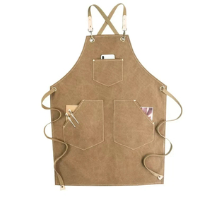 Tablier classique en coton avec plusieurs poches, résistant à l'eau et élégant, idéal pour les produits de nettoyage et l'usage quotidien - Product Image 1
